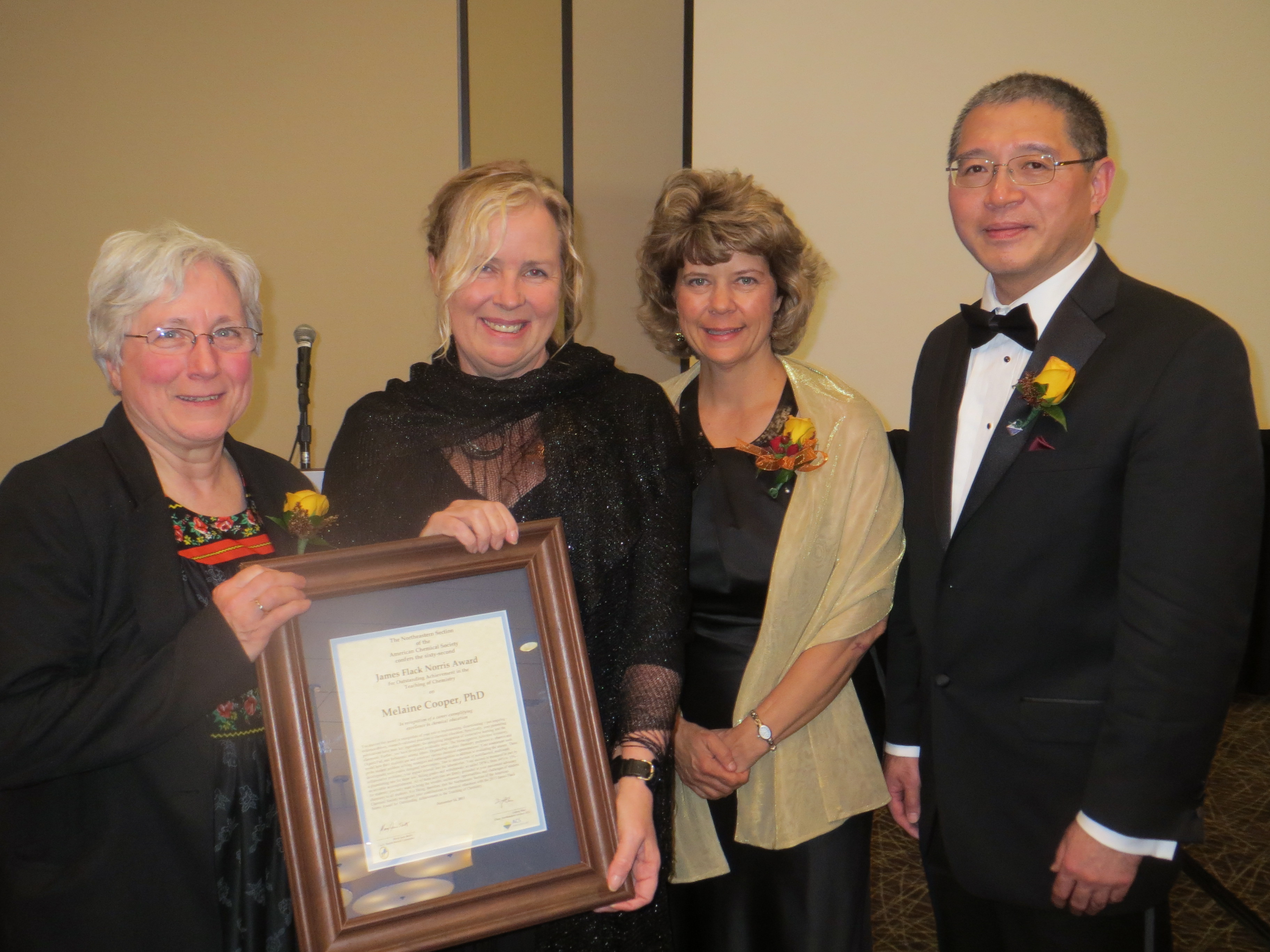 Melanie Cooper accepts the James Flack Norris award