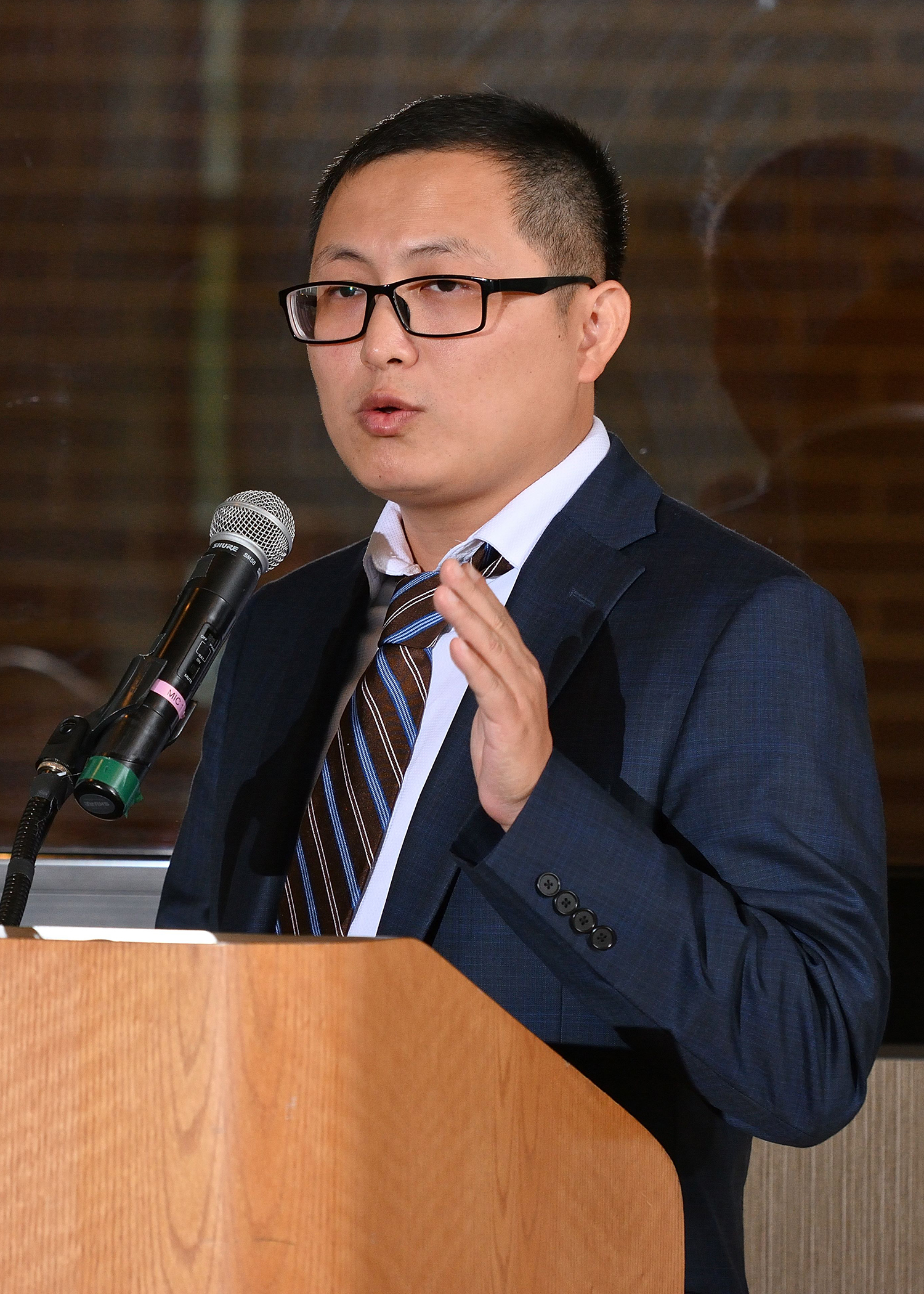 Tuo Wang speaks about his research during the Sept. 28 investiture ceremony. James Hoeschele established the Carl H. Brubaker, Jr. Endowed Professorship in 2022, with the goal of recruiting and retaining outstanding faculty members in the MSU Department of Chemistry. Photo Credit: Harley Seeley 