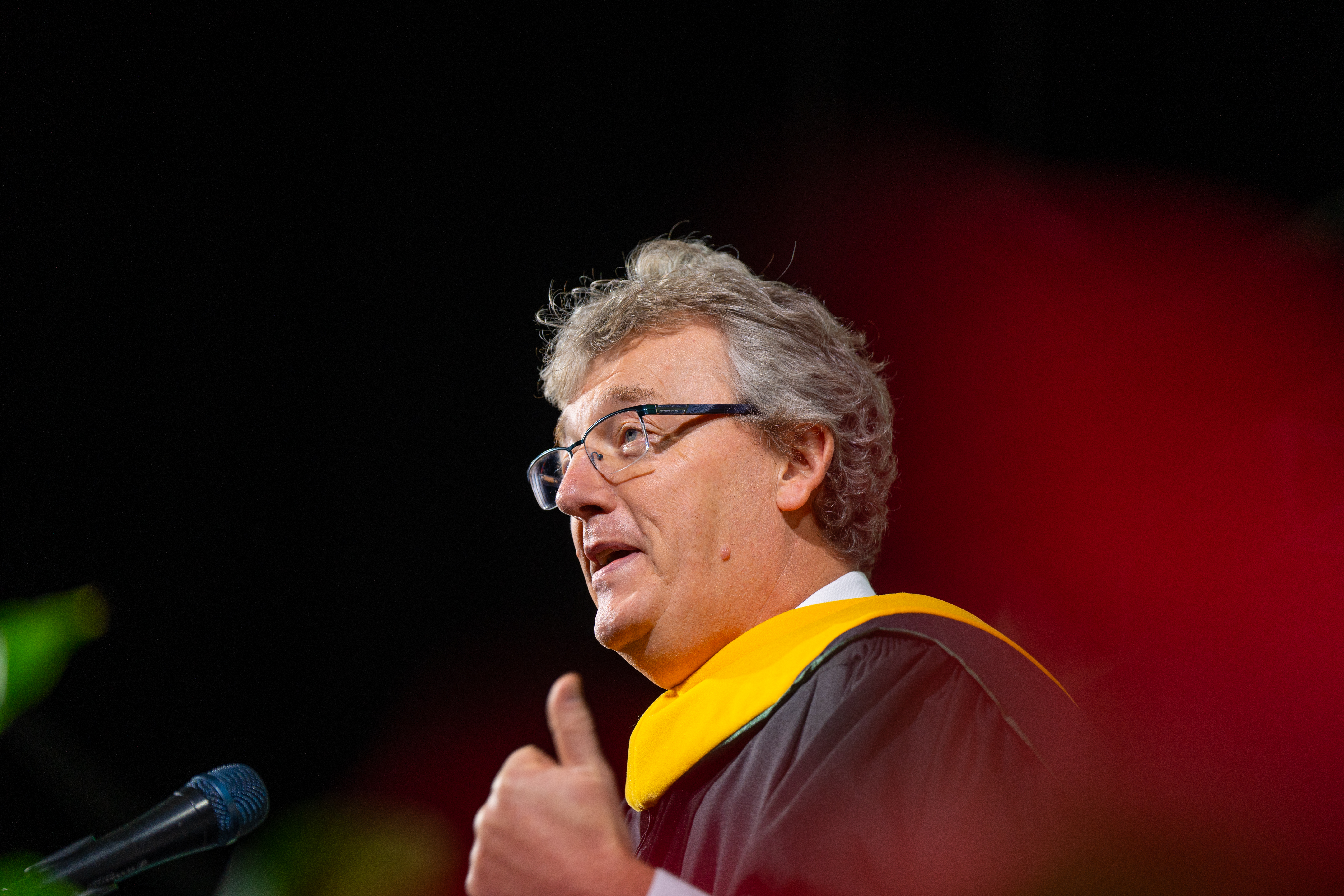 David MacMillan addresses graduates during fall commencement. During his speech, he encouraged the newest class of Spartans to learn from others, laugh every day, and learn from failure. He made special note of the hardships the class of 2023 overcame, and how these challenges prepared them more than ever to change the world. Photo credit: Michigan State University/Nick Schrader.