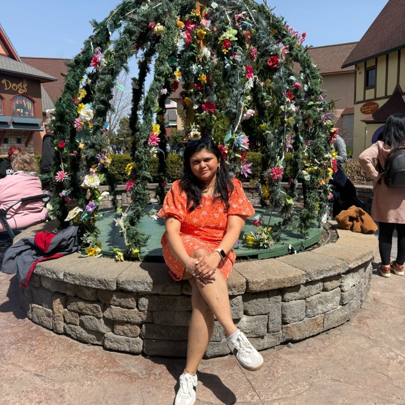 Deepika Davuluri in orange dress
