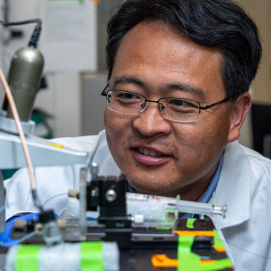 Liangliang Sun at work in his lab.