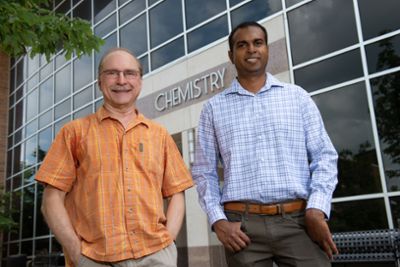 Kennie Merz and Madu Manathunga standing in front of the MSU Chemistry Building