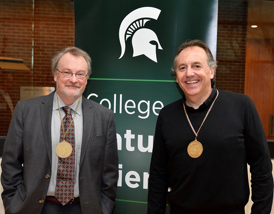 NatSci's James McCusker, Department of Chemistry (left); and Bruno Basso, Department of Earth and Environmental Sciences, were honored as MSU Foundation Professors on April 24 at an investiture ceremony held at MSU's Wharton Center. Photo by Harley Seeley.