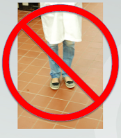 Photo of person wearing pants with holes.